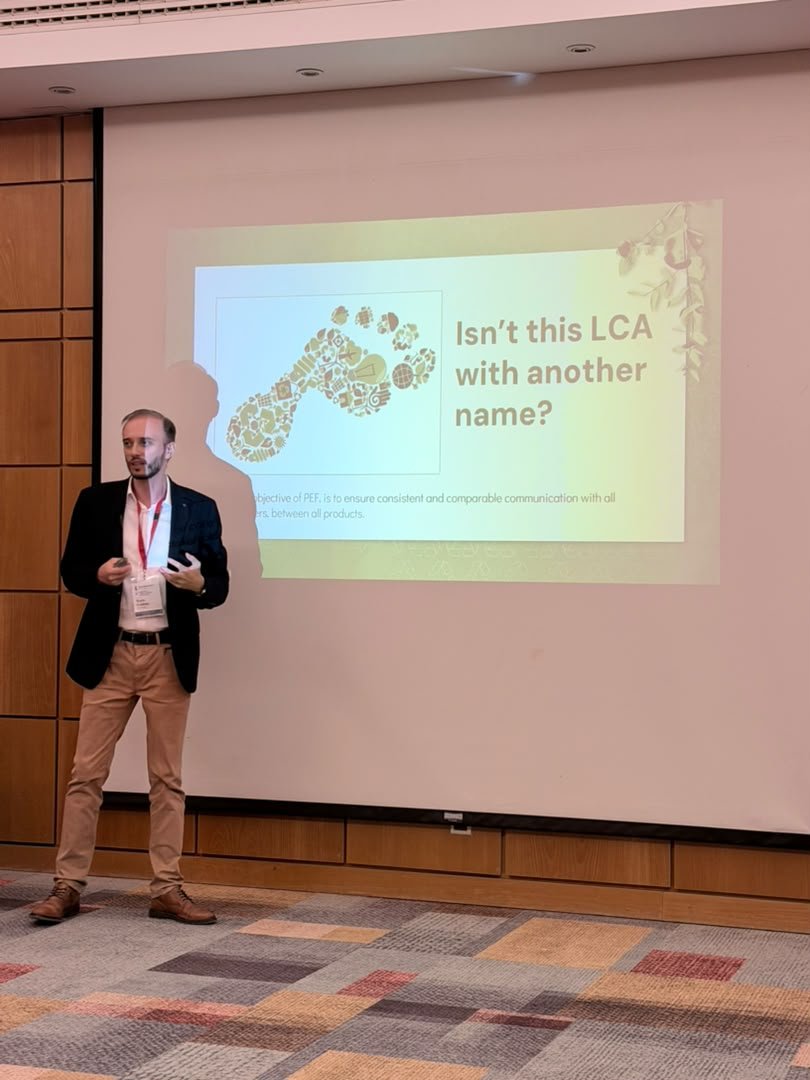 Speaker presenting to the conference
